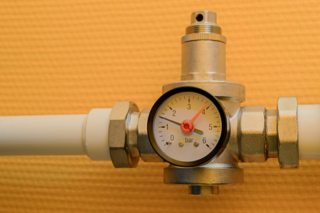 Pressure reducer with manometer on polypropylene water pipeの写真素材