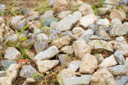 bunch of rocks and granite on the groundの写真素材