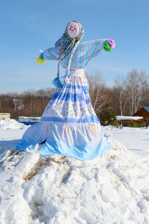 Decorated and dressed effigy of Maslenitsa on a sunny winter dayの写真素材