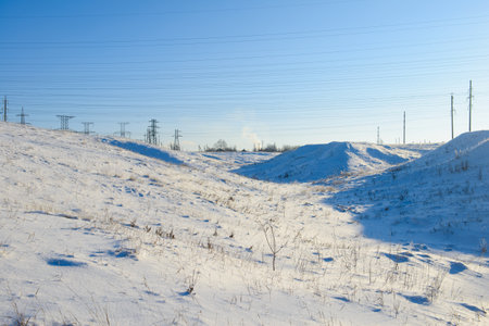 A snow-covered ravine on a sunny winter dayの写真素材