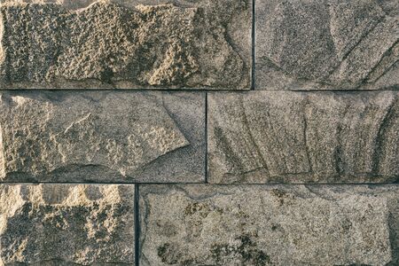 Background, texture of an old stone wall.