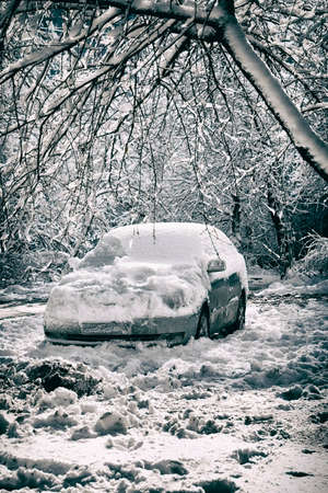 A car covered with ice and snow.の写真素材