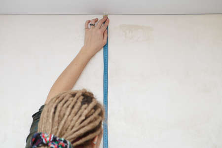 Apartment Renovation  Measurement of wall の写真素材