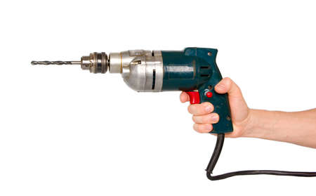 Hand with electric drill.