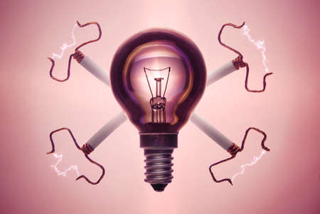 Light bulb with sparkling wires looking like Jolly Roger 