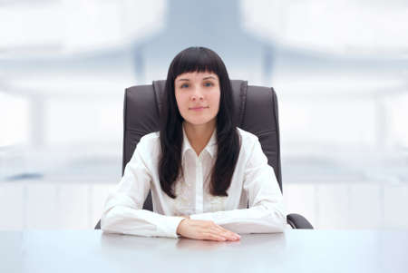 Young businesswoman at her office 