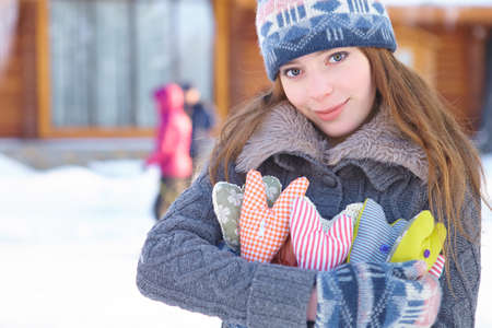 Winter. Girl with heart shapes outdoor.の写真素材