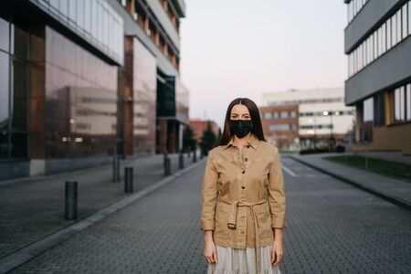 young woman in a protective maskの写真素材