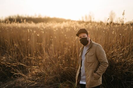 young guy in a protective maskの写真素材
