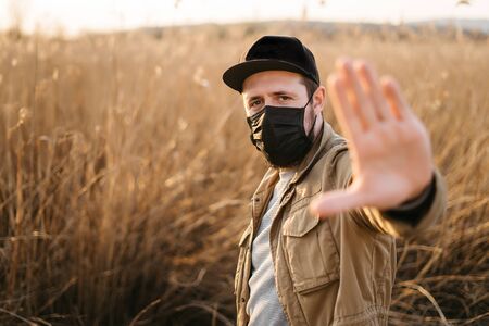 young guy in a protective maskの写真素材