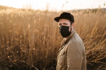 young guy in a protective maskの写真素材