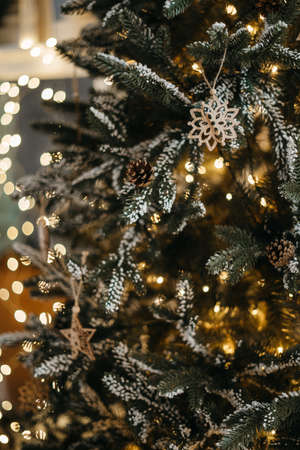Christmas decorations hanging on fir tree. christmas tree detail. High quality photoの写真素材