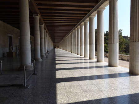 Columns view from under the ceiling of ancient Agorà reconstruction in Athensのeditorial素材