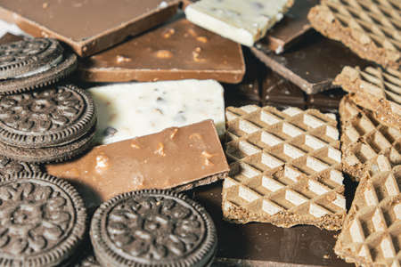 heap of chocolate, round . All sprinkled with cocoa. World Chocolate Day.の写真素材