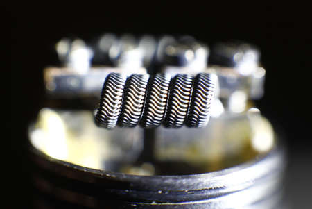 Alien coil build on vaping rebuildable dripping atomizerの写真素材