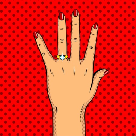 Wedding golden ring on hand pop art vectorのイラスト素材