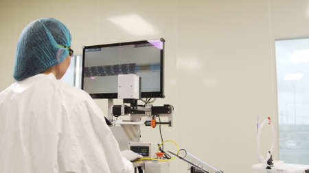 scientist studies and tests on the scientific equipment, the coronary stent. Coronary stent is a...