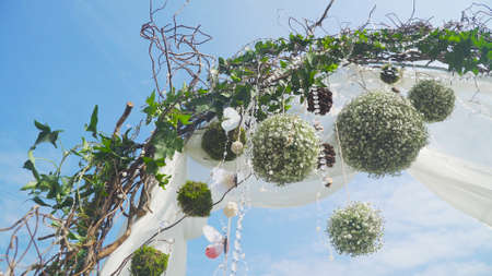 Arch for the wedding ceremony, decorated with cloth and flowers. Decorated with flowers Wedding frame.の写真素材