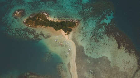 Tropical lagoon with turquoise water and white sand. Beautiful beach. Tropical bay in El Nido....