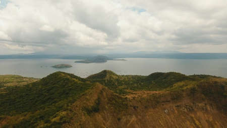 Aerial view Taal Volcano on Luzon Island North of Manila in Philippines. Volcano with a crater on an island in the middle of a lake. Luzon, Philippines. Travel concept.の写真素材