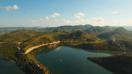 Seascape with a tropical bay surrounded by mountains on the island. Aerial view: Beautiful tropical sea bay. Scenic landscape with mountain islands and blue lagoon. Coron, Philippines,Palawan, Busuanga. Travel concept.の写真素材