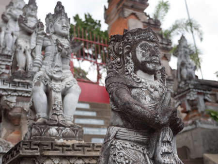 Hindu temple with statues of the gods on Bali island, Indonesia. Balinese Hindu Temple, old hindu architecture, Bali Architecture, Ancient designの写真素材