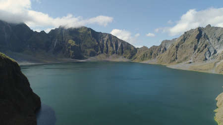 Crater lake of the volcano Pinatubo among the mountains, Philippines, Luzon. Aerial view beautiful...