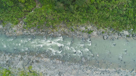 Aerial view of mountain river in the cordillera gorge. Cordillera region. Luzon, Philippines. Mountain landscape.の写真素材