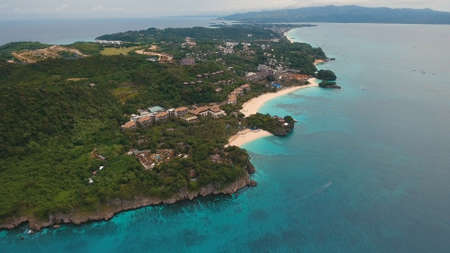 Aerial view of beautiful tropical island with white sand beach, Boracay, hotels and tourists....