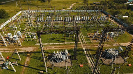 Aerial view Power plant, transformation station, cables and wires. High voltage electric power...