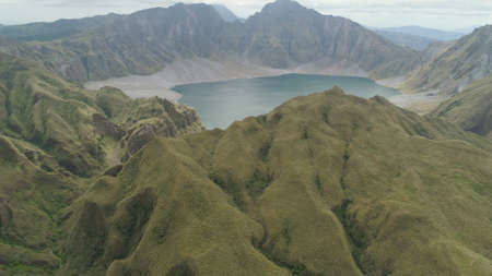 Crater lake of the volcano Pinatubo among the mountains, Philippines, Luzon. Aerial view beautiful landscape at Pinatubo mountain crater lake. Travel conceptの写真素材
