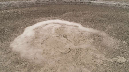 Mud volcano bledug kuwu. aerial view volcanic plateau with geothermal activity and geysers,...