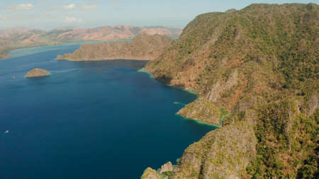 blue lagoons and cliffs of tropical mountain island. aerial view seascape, tropical landscape. Palawan, Philippines, Coron. travel conceptの写真素材