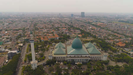 aerial view mosque in Indonesia Al Akbar in Surabaya, Indonesia. beautiful mosque with minarets on island Java Indonesia. mosque in an asian cityの写真素材