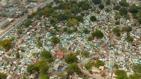 Manila North Cemetery in Manila, Philippines. Many of the mausoleums are inhabited by impoverished families. Travel concept.の写真素材
