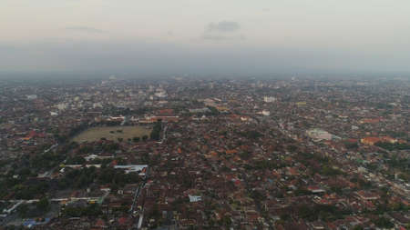 aerial view yogyakarta city cultural capital indonesia located on java island. Yogyakarta with buildings, highway at sunset time. aerial viewの写真素材