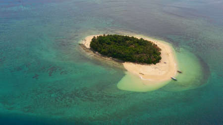 Aerial view of Tropical island with a sandy beach. Summer and travel vacation concept. Rosa island, Philippines.の写真素材