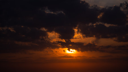 Sunset, sunrise with clouds. orange skies and sunの写真素材