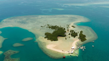 Beautiful beach on tropical island surrounded by coral reef, sandy bar with tourists. honda bay top view. Luli island. Summer and travel vacation concept, Philippines, Palawanの写真素材