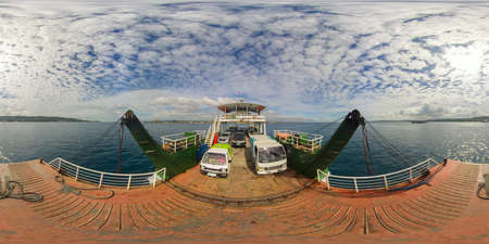 Passenger ferry carrying people ,cars and cargo to the island of Samal. Davao City, Philippines....