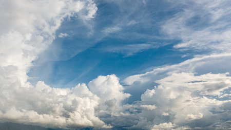 White, fluffy clouds in blue sky. Background from clouds.の写真素材