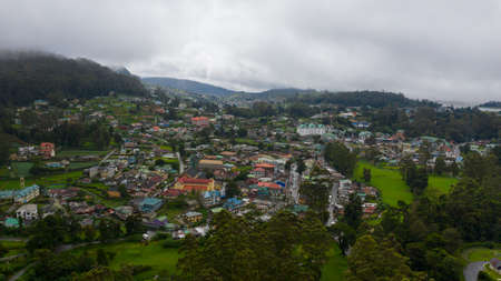 The town of Nuwara Eliya is covered with clouds among green hills and mountains. Sri Lanka.の写真素材