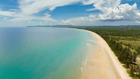 Seascape with tropical sandy beach and blue ocean. Borneo, Malaysia. Tindakon Dazang Beach.の写真素材