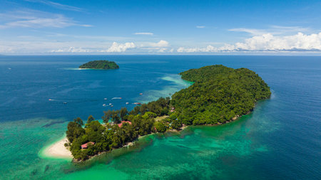 Tropical islands and beautiful beach. Manukan and Sulug islands. Tunku Abdul Rahman National Park. Kota Kinabalu, Sabah, Malaysia.の写真素材