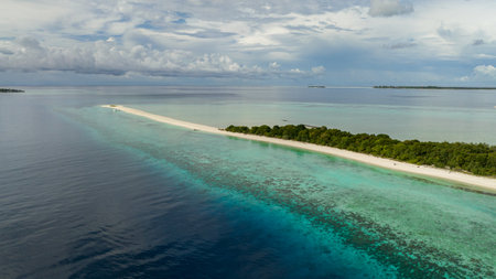Tropical sandy beach and blue sea. Timba Timba islet. Tun Sakaran Marine Park. Borneo, Sabah, Malaysia.の写真素材
