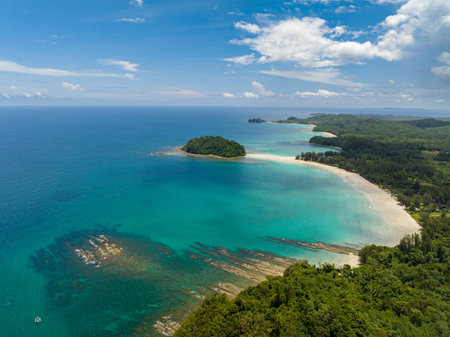 Aerial view of tropical landscape with sandy beach and island. Kelambu Beach. Borneo, Malaysia.の写真素材
