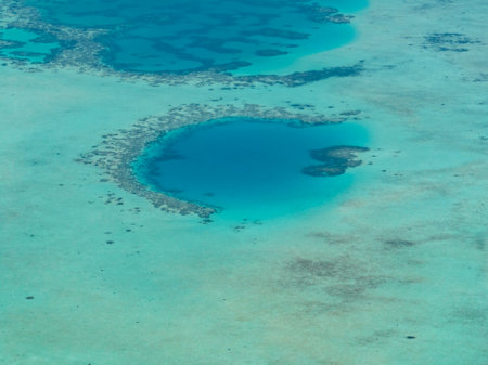 Aerial view of atoll with a coral reef and clear turquoise water. Borneo, Malaysia.の写真素材