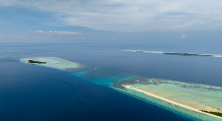 Top view of tropical islands on the atoll and coral reef. Timba Timba islet. Tun Sakaran Marine Park. Borneo, Sabah, Malaysia.の写真素材