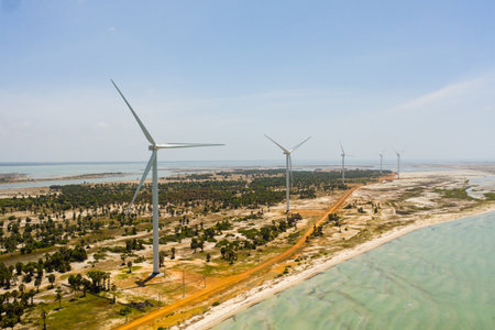 Aerial view of Group of windmills for renewable electric energy production. Jaffna, Sri Lanka. Wind...