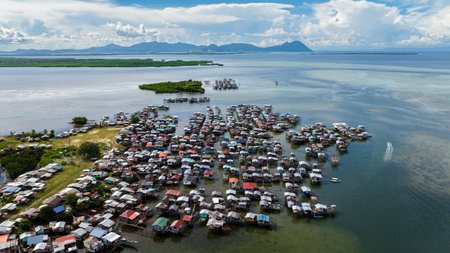Aerial view of village of fishermen and farmers on the water in Asia. Borneo,Semporna. Sabah, Malaysia.の写真素材